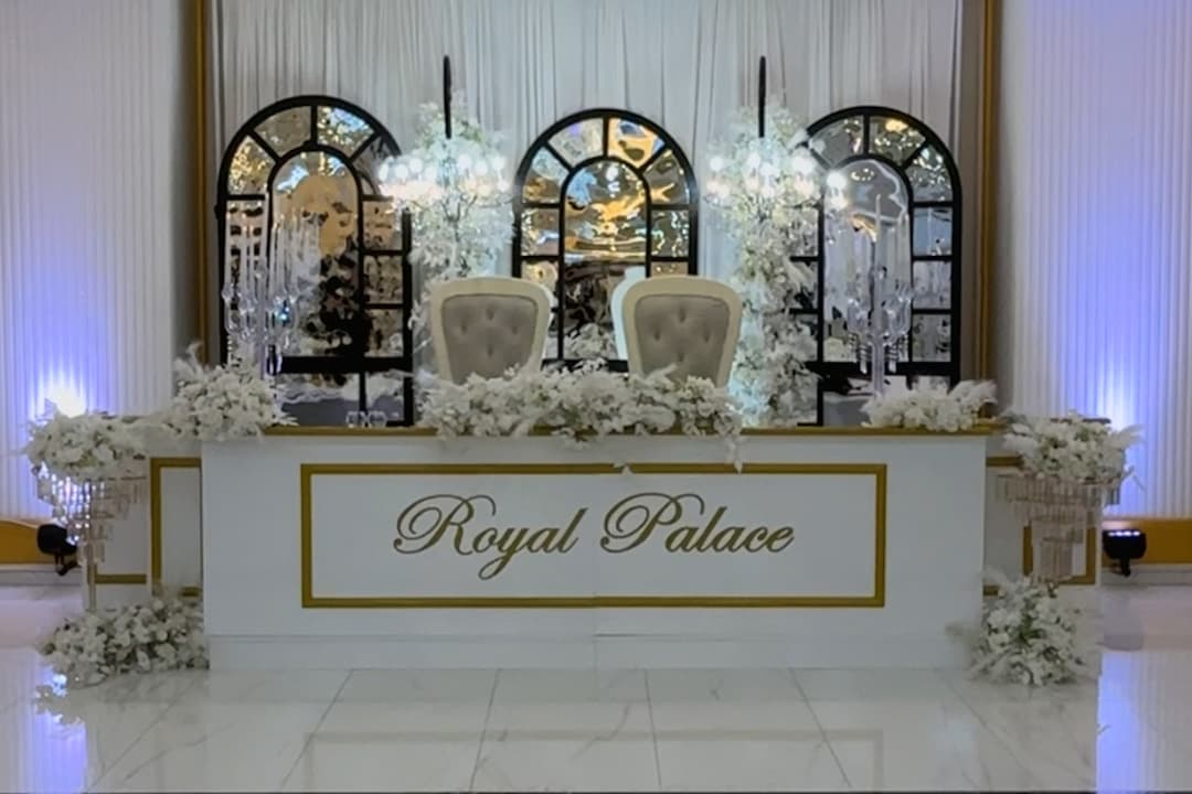 The Grand Hall with chandeliers and frescoed ceilings